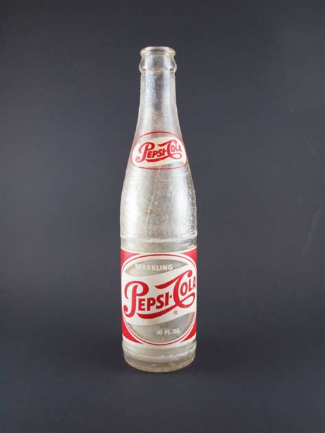 Vintage Pepsi Cola Soda Bottle 10 oz Clear Glass Bottle ACL Red White 1953 Embossed Pop Bottle Advertising PanchosPorch (6.3k) Sale Price $11.96 $ 11.96 $ 14.95 Original Price $14.95 (20% off) Add to Favorites Vintage Limited Edition Pepsi-Cola Co. Commemorative Bottle New Bern, NC 10oz (44) $ 15.00. Add to Favorites ...